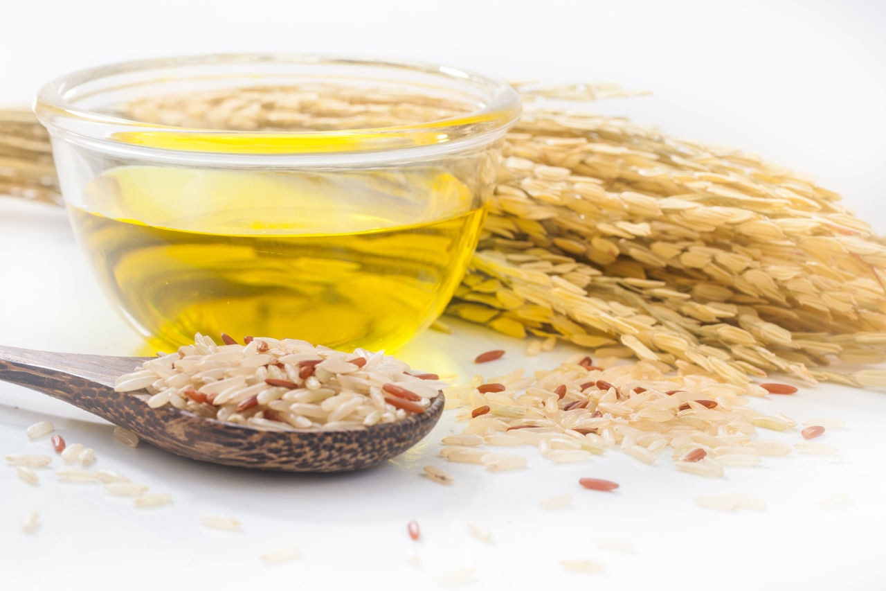 Rice bran oil in bottle glass with seed