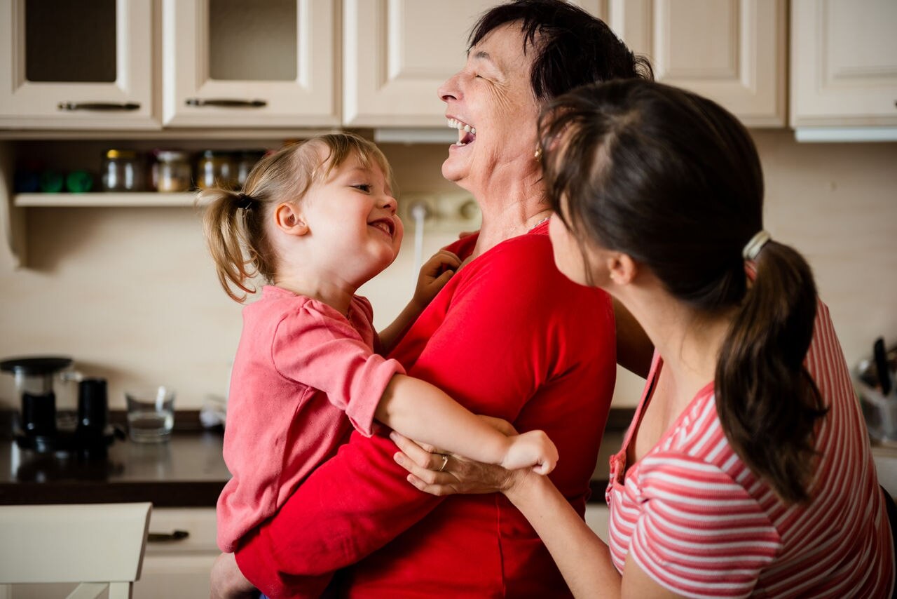 family having fun together in the kitchen