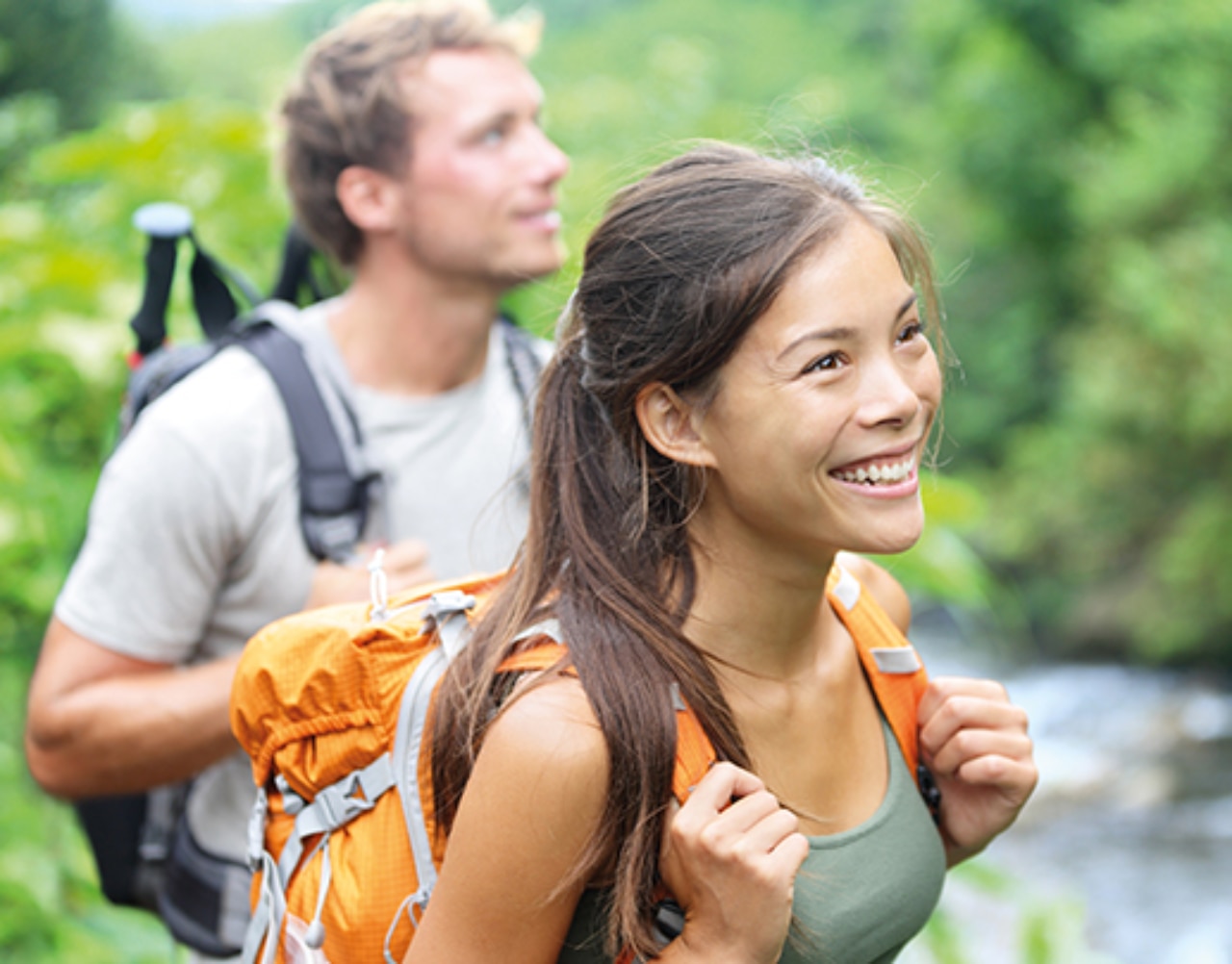 Couple hiking in the jungle