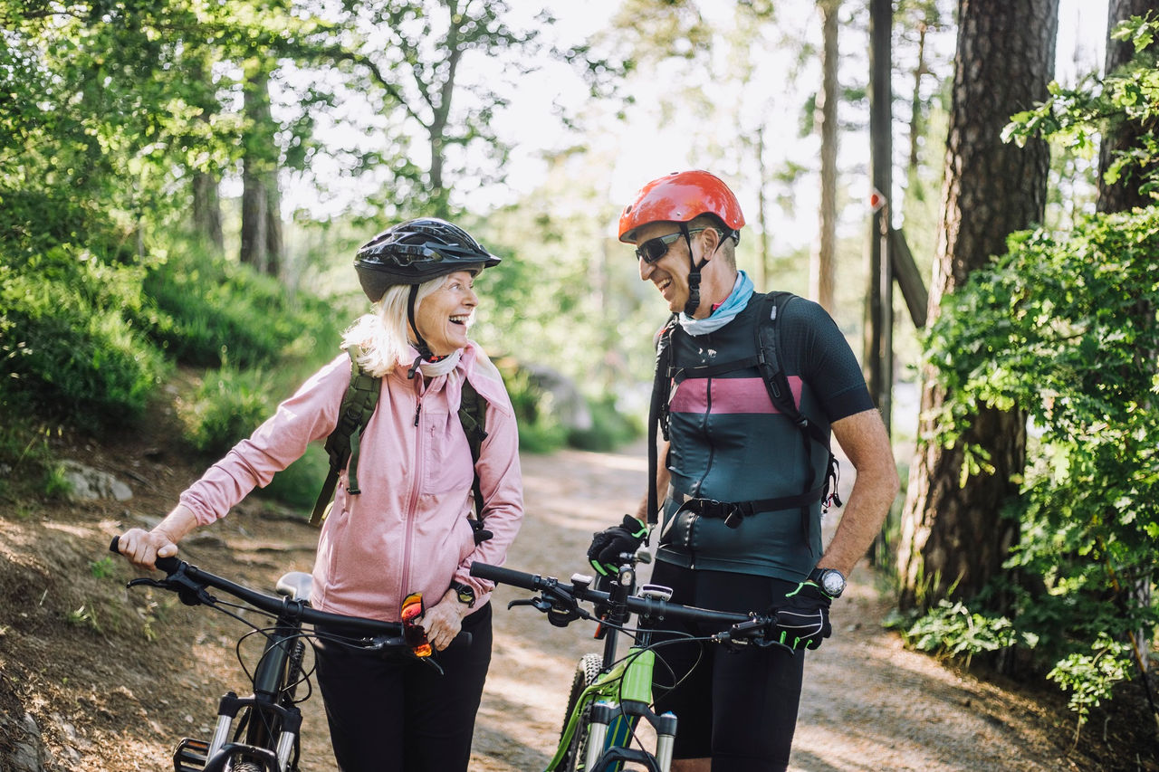 Senior couple cycling together