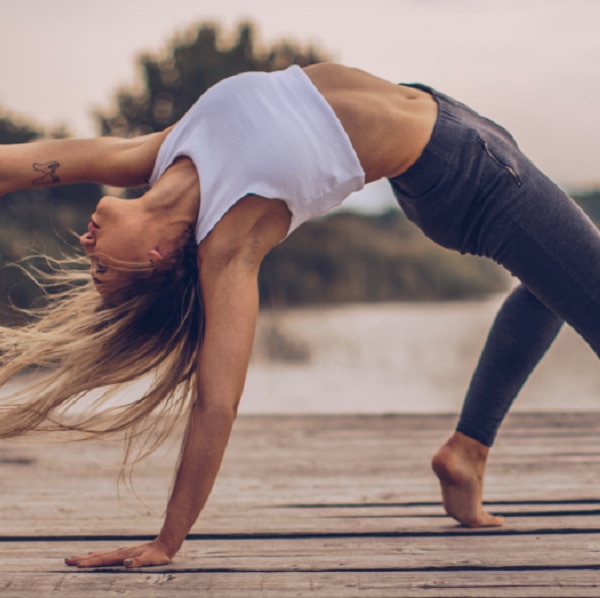Fit woman practicing yoga