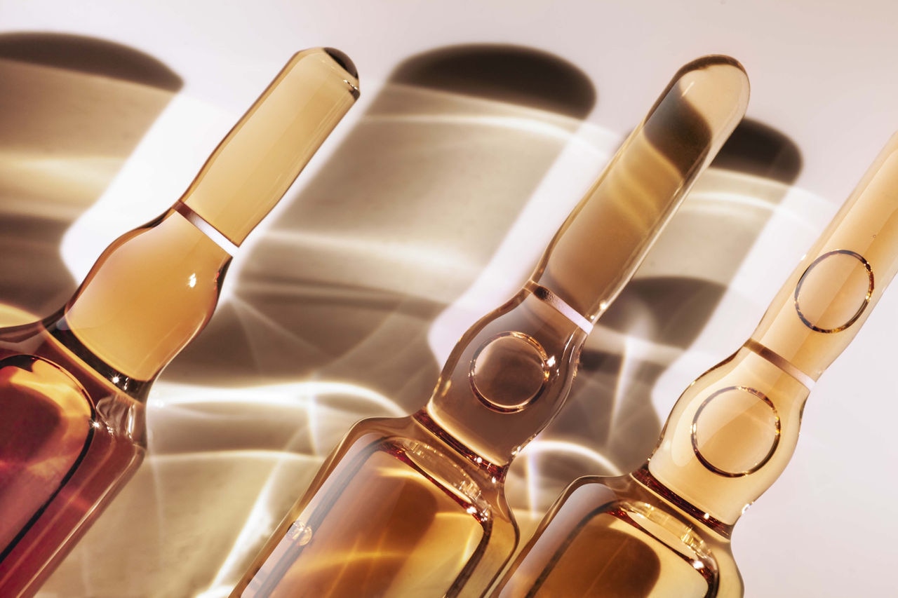 Cosmetic or medical ampoule contrast shadow background