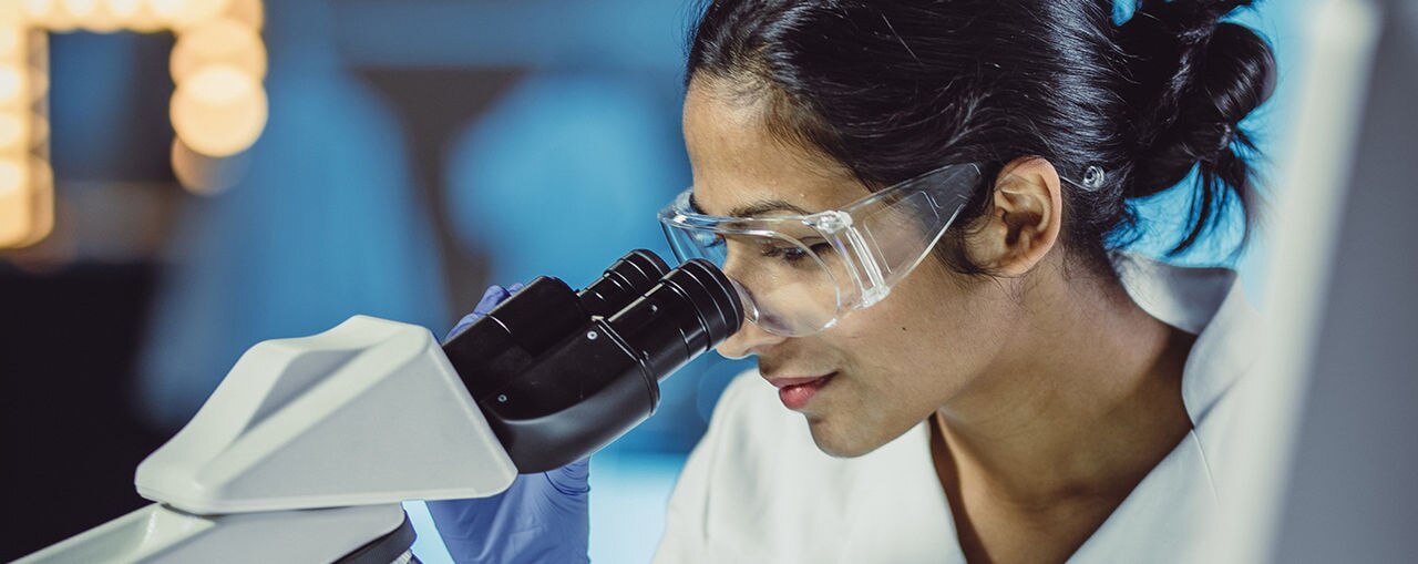 Portrait of a Female Scientist Working in The Laboratory