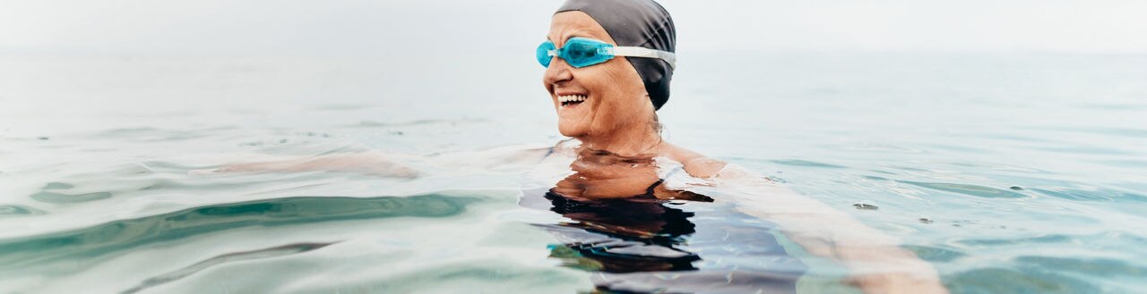 Photo of a senior female swimmer in the sea