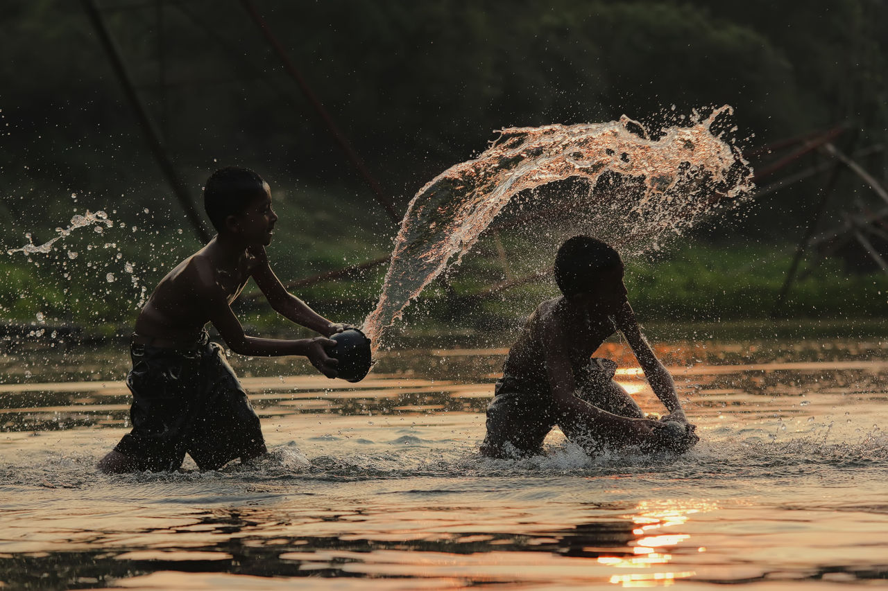 Children's life with rural rivers of Asia,Asia children in the forest at countryside.