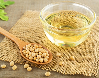 Soy beans and oil on sack