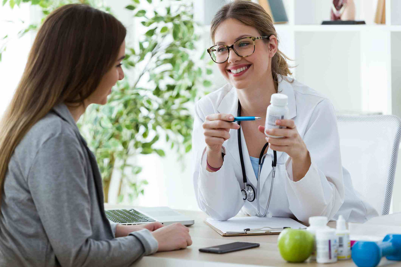 Female doctor with patient 