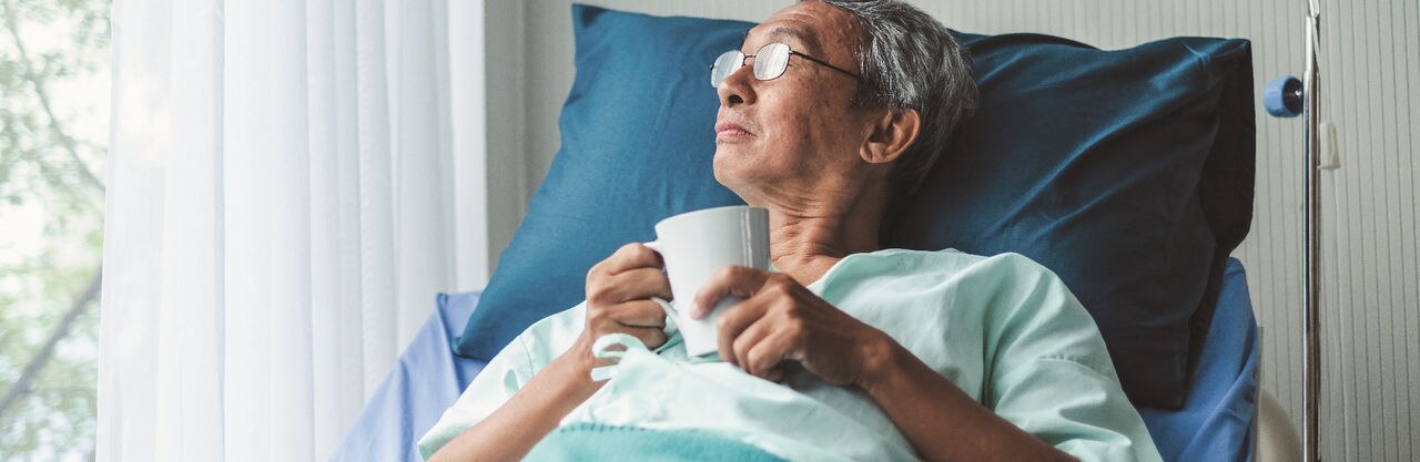 Lonely old asian patient on patient bed in hospital