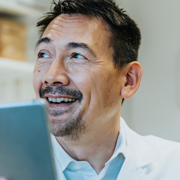 Scientist with a digital tablet in laboratory, NRW, Germany