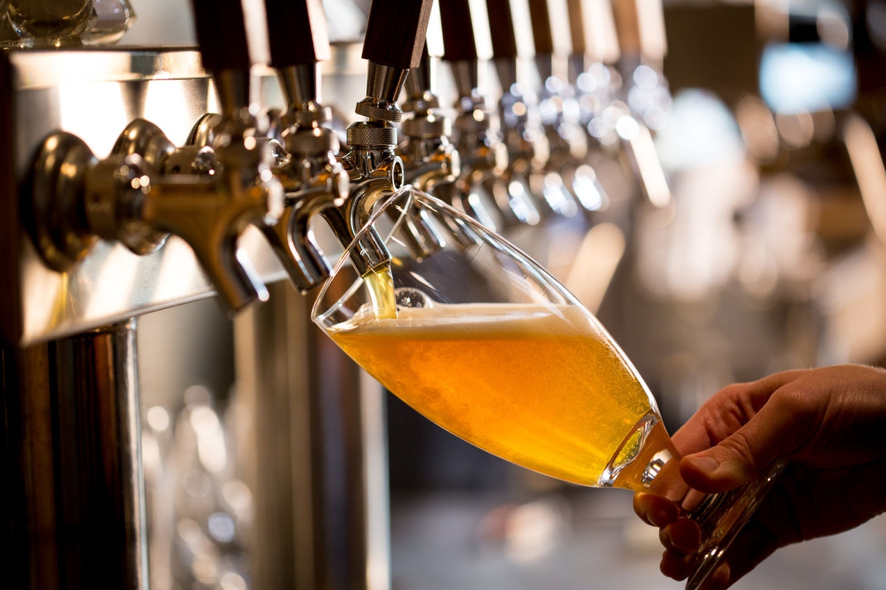 Craft beer pour being tapped